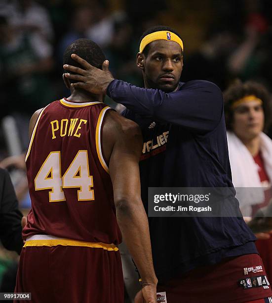 LeBron James of the Cleveland Cavaliers celebrates with teammate Leon Powe after defeating the Boston Celtics, 124-95 in Game Three of the Eastern...