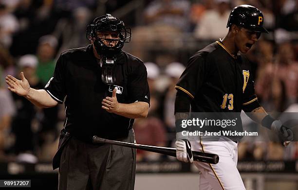 Ronny Cedeno of the Pittsburgh Pirates argues a called three strike with home plate umpire Fieldin Culbreth during the game against the St Louis...