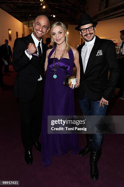 Peyman Amin and Regina Halmich and Manuel Cortez attend the 'Duftstars 2010' at the Station on May 7, 2010 in Berlin, Germany.