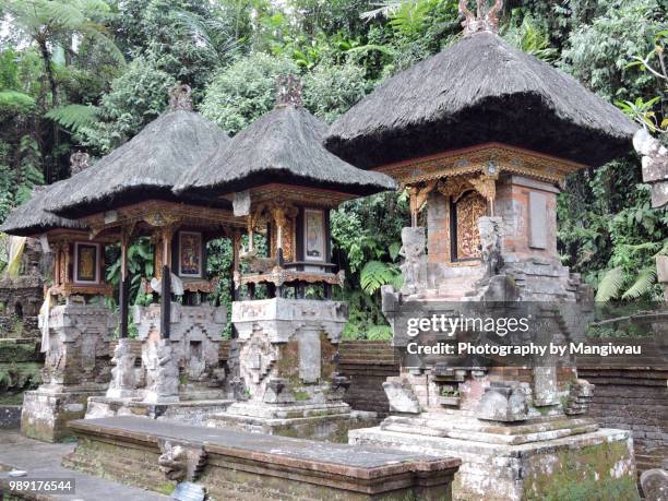 balinese temple - incense coils stock-fotos und bilder