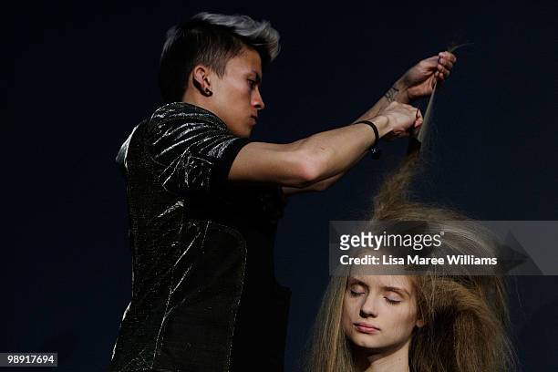 Model has her hair teased backstage at Alex Perry's 'Arabian Princess' show at Fox Studios during Rosemount Australian Fashion Week Spring/Summer...