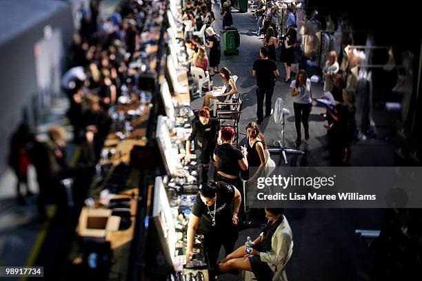 Huge team of make-up artists, hairdressers and models prepare backstage at Alex Perry's 'Arabian Princess' show at Fox Studios during Rosemount...