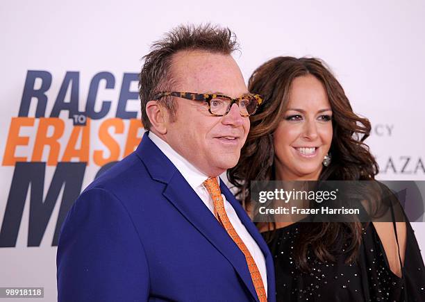 Actor Tom Arnold and Ashley Groussman arrive at the 17th Annual Race to Erase MS event co-chaired by Nancy Davis and Tommy Hilfiger at the Hyatt...