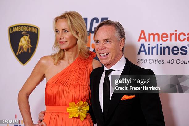 Dee Ocleppo and designer Tommy Hilfiger arrive at the 17th Annual Race to Erase MS event co-chaired by Nancy Davis and Tommy Hilfiger at the Hyatt...