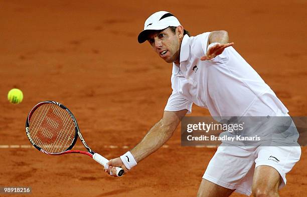 Paul Hanley of Australia plays a forehand volley during his doubles match against Takao Suzuki and Go Soeda of Japan during the match between...