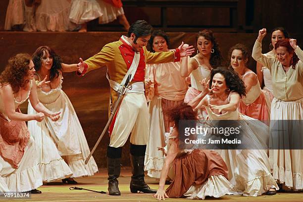 Baritone Edgar Gil in action during a previous test of the Opera 'Carmen' of Georges Bizet at the Esperanza Iris City Theater on May 7, 2010 in...