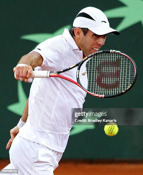 Paul Hanley of Australia plays a backhand in his doubles match against Takao Suzuki and Go Soeda of Japan during the match between Australia and...