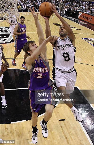 Guard Tony Parker of the San Antonio Spurs takes a shot against Goran Dragic of the Phoenix Suns in Game Three of the Western Conference Semifinals...