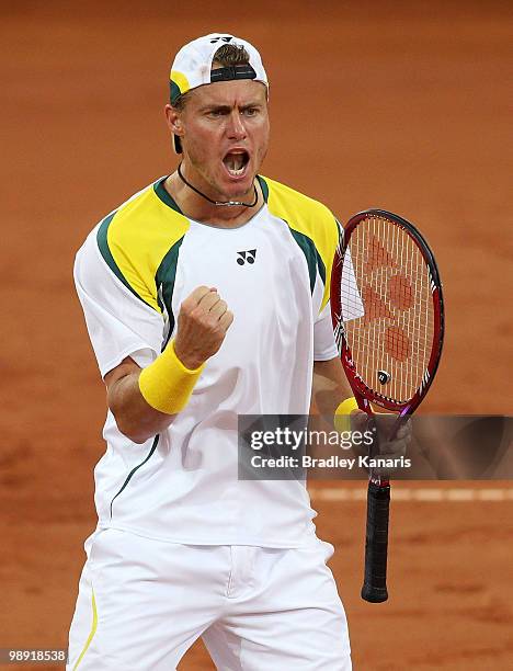 Lleyton Hewitt of Australia celebrates winning a point in his doubles match against Takao Suzuki and Go Soeda of Japan during the match between...