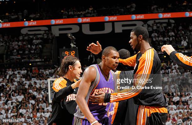 Leandro Barbosa of the Phoenix Suns is congratulated by his team after a play against the San Antonio Spurs in Game Three of the Western Conference...