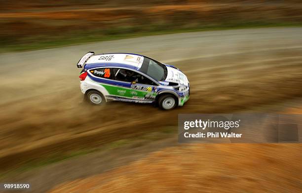 Xavier Pons and co-driver Alex Haro of Spain drive their Ford Fiesta S2000 during stage 12 of the WRC Rally of New Zealand on the Te Akau Coast on...