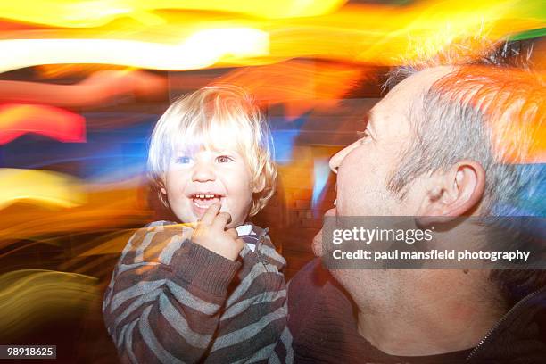 father and son bonding - paul mansfield photography stock-fotos und bilder