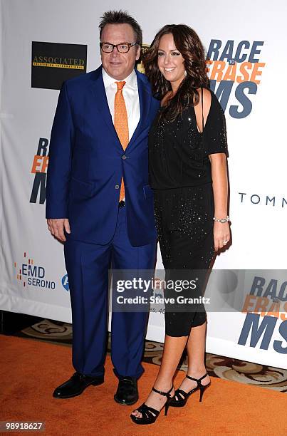 Actor Tom Arnold and Ashley Groussman arrive at the 17th Annual Race to Erase MS event co-chaired by Nancy Davis and Tommy Hilfiger at the Hyatt...