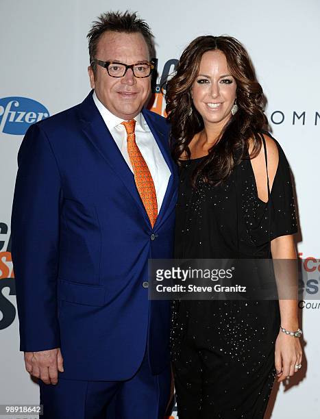 Actor Tom Arnold and Ashley Groussman arrive at the 17th Annual Race to Erase MS event co-chaired by Nancy Davis and Tommy Hilfiger at the Hyatt...
