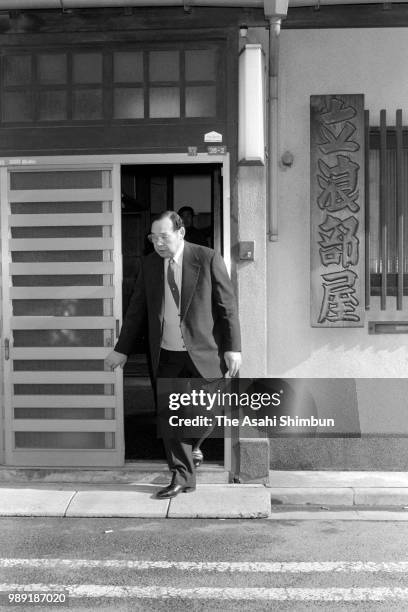 Stablemaster Tatsunami leaves his stable to report the disappearance of yokozuna Futahaguro to the Japan Sumo Association on December 30, 1987 in...