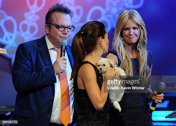 Actor Tom Arnold with TV personalities Brooke Burke and Nancy O'Dell onstage during the 17th Annual Race to Erase MS event co-chaired by Nancy Davis...