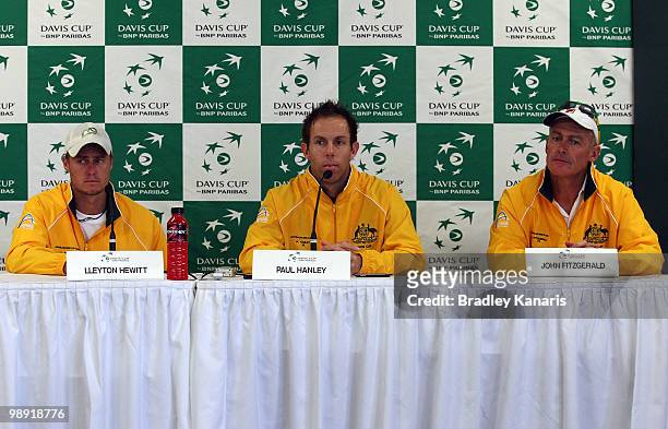 Lleyton Hewitt, Paul Hanley and John Fitzgerald of Australia speak at a post match conference after their doubles match against Go Soeda and Takao...