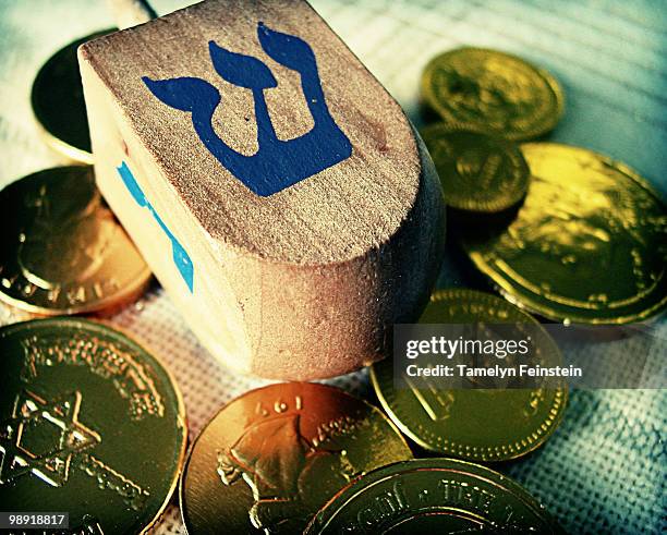 dreidel and gelt - chocolate coin stock pictures, royalty-free photos & images