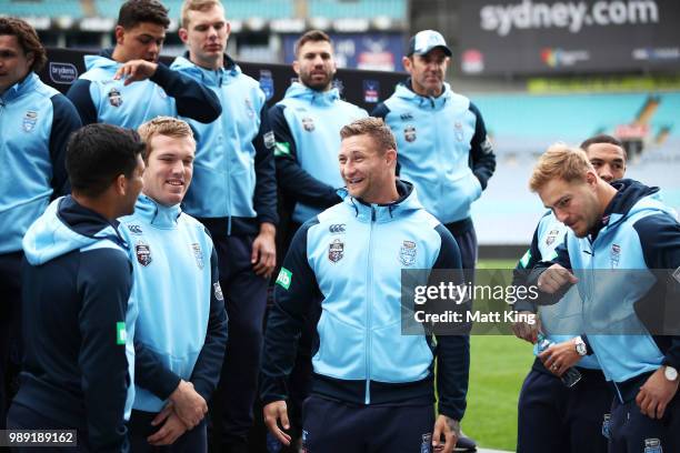 Tariq Sims talks to team mates during the New South Wales Blues State of Origin Team Announcement at ANZ Stadium on July 2, 2018 in Sydney, Australia.