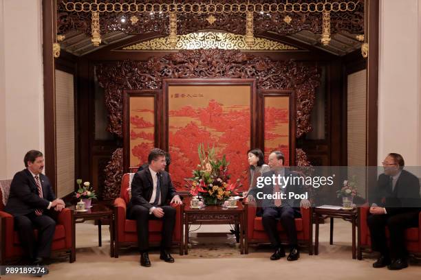 President of the United Nations General Assembly Miroslav Lajcak, second from left, meets with Chinese Vice President Wang Qishan, second from right,...