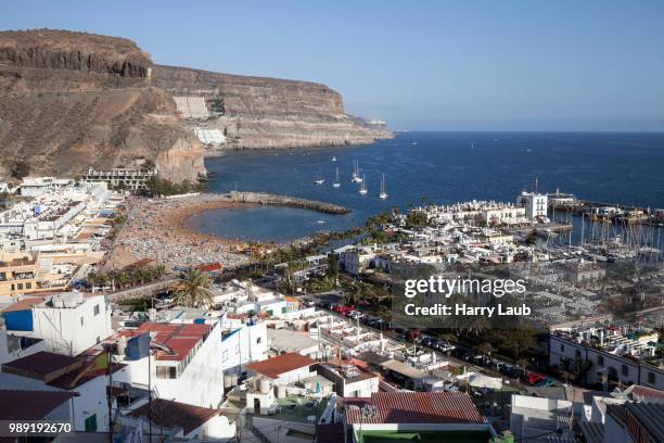 view from the mirador towards puerto de mogan with marina and coast, gran canaria, canary islands, spain - puerto de mogan stock-fotos und bilder