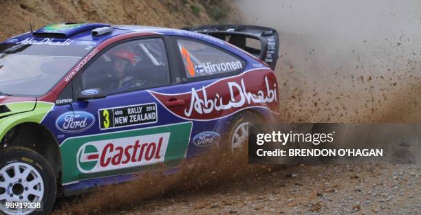 Ford Abu Dhabi world Rally team driver in a Ford RS, Mikko Hirvonen of Finland and co driver Jarmo Lehtinen drive during day 2 of the Rally New...