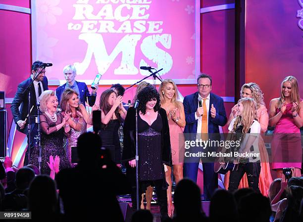 Barbara Davis, Linda Gray, musician Ann Wilson of Heart, Linda Thompson, Tom Arnold, singer Avril Lavigne, Nancy Davis and olympic gold medalist...