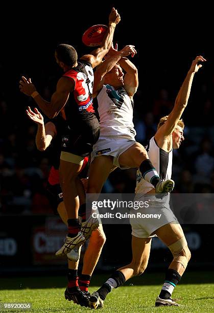 Jarrod Atkinson of the Bombers spoils a mark by Brett Ebert of the Power during the round seven AFL match between the Essendon Bombers and the Port...