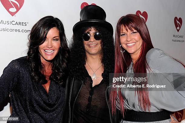 Model Janice Dickinson, musician Slash and Perla Hudson arrive at the 6th Annual MusiCares MAP Fund Benefit Concert at Club Nokia on May 7, 2010 in...