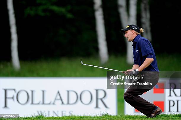 Marcel Siem of Germany reacts to his chip shot on the seventh hole during the third round of the BMW Italian Open at Royal Park I Roveri on May 8,...