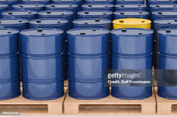 metal barrels on pallets, many blue and a single yellow - multi barrel stock illustrations