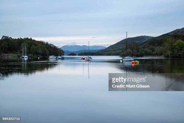 calm moody evening landscape over coniston water in english lake - coniston stock pictures, royalty-free photos & images