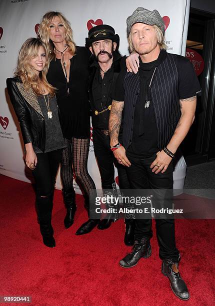 Musicians Allison Robertson, Corey Parks, Lemmy Kilmister and Matt Sorum arrive at the 6th Annual MusiCares MAP Fund Benefit Concert at Club Nokia on...