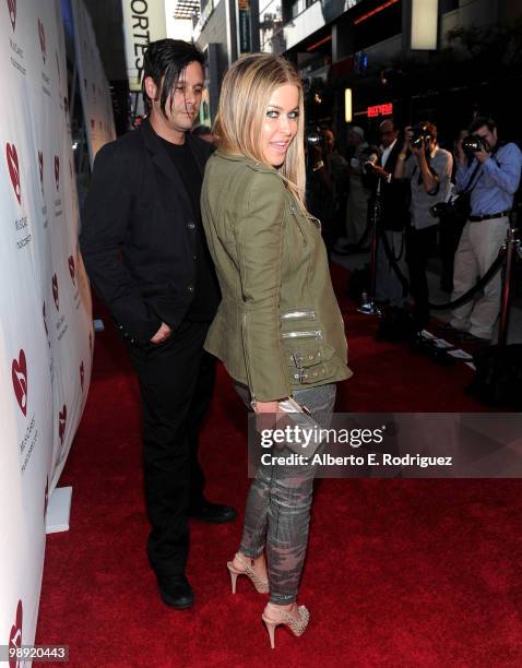 Actress Carmen Electra and musician Rob Patterson arrive at the 6th Annual MusiCares MAP Fund Benefit Concert at Club Nokia on May 7, 2010 in Los...