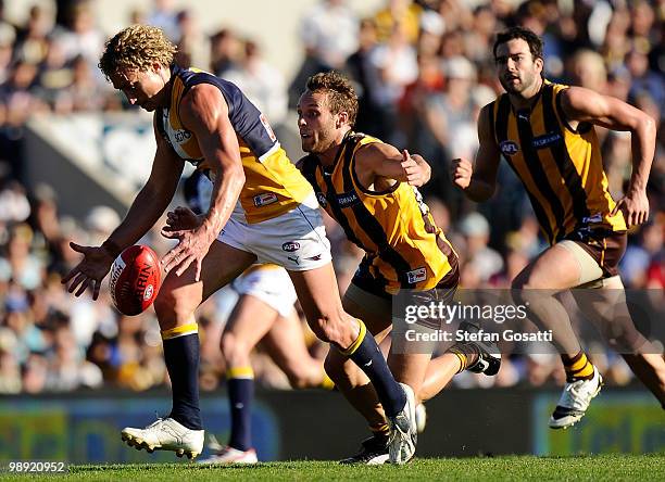 Matt Priddis of the Eagles attempts to control the ball during the round seven AFL match between the West Coast Eagles and the Hawthorn Hawks at...