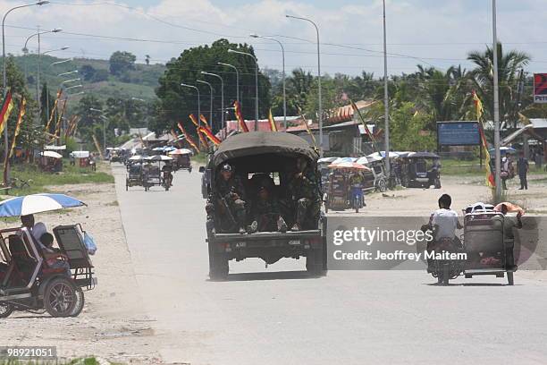 Philippine security forces on a security patrol on May 8, 2010 in Shariff Aguak, Maguindanao Province, Philippines. Shariff Aguak was the location of...