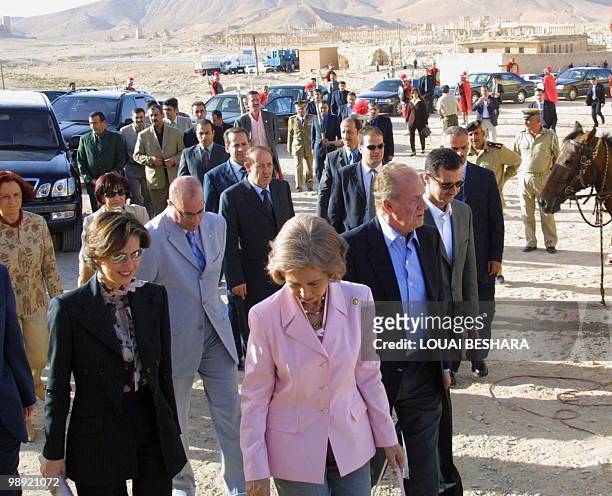 Spain's King Juan Carlos , Queen Sofia , Syria's First Lady Asma al-Assad and Syrian President Bashar al-Assad arrive at an ancient site during their...