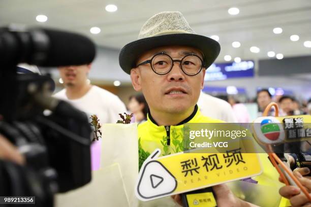 Comedian Zhou Libo is seen at Shanghai Pudong International Airport after the court dismissed his case on June 30, 2018 in Shanghai, China. Chinese...