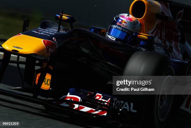 Sebastian Vettel of Germany and Red Bull Racing drives during the final practice session prior to qualifying for the Spanish Formula One Grand Prix...
