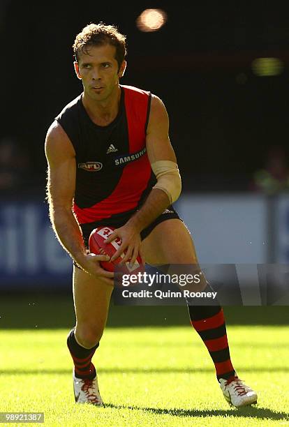 Mark McVeigh of the Bombers kicks during the round seven AFL match between the Essendon Bombers and the Port Adelaide Power at Etihad Stadium on May...