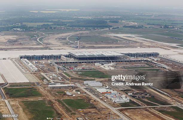 In this aerial view the new main terminal and the construction site of the new Airport Berlin Brandenburg International BBI are pictured on May 8,...