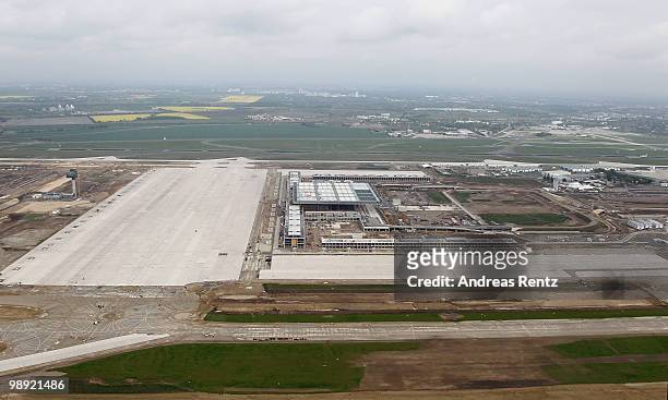 In this aerial view the new main terminal and the construction site of the new Airport Berlin Brandenburg International BBI are pictured on May 8,...