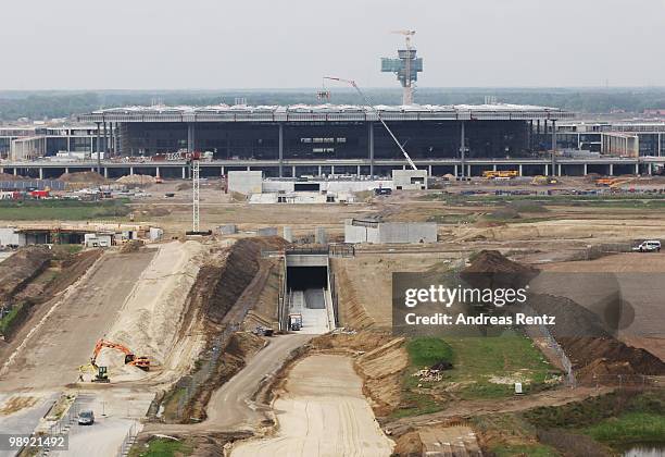 In this aerial view the new main terminal and the construction site of the new Airport Berlin Brandenburg International BBI are pictured on May 8,...