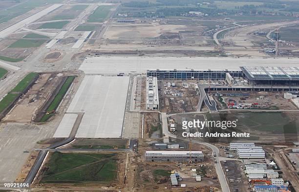 In this aerial view the new main terminal and the construction site of the new Airport Berlin Brandenburg International BBI are pictured on May 8,...