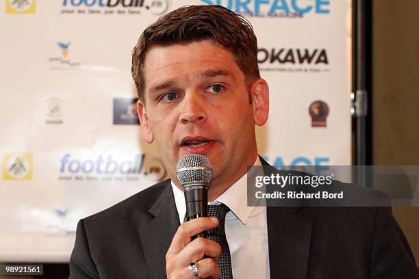 Eric Pinet of the "Nos Petits Freres et Soeurs" association speaks at the World Charity Soccer for Haiti press conference at Hotel de Ville on May 7,...