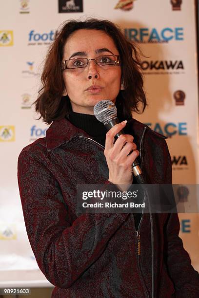 Florence Raud of "Nos Petits Freres et Soeurs" association speaks at the World Charity Soccer for Haiti press conference at Hotel de Ville on May 7,...