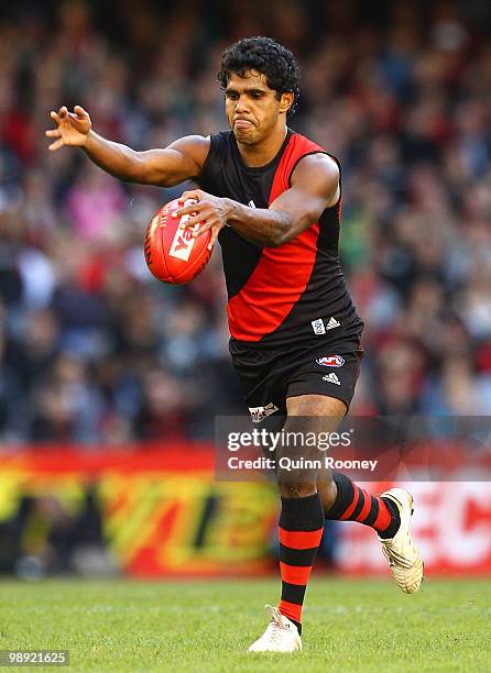 Alwyn Davey of the Bombers kicks during the round seven AFL match between the Essendon Bombers and the Port Adelaide Power at Etihad Stadium on May...