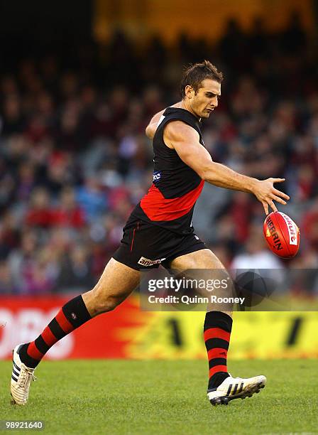 Jobe Watson of the Bombers kicks during the round seven AFL match between the Essendon Bombers and the Port Adelaide Power at Etihad Stadium on May...