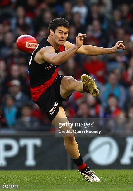 Ben Howlett of the Bombers kicks during the round seven AFL match between the Essendon Bombers and the Port Adelaide Power at Etihad Stadium on May...