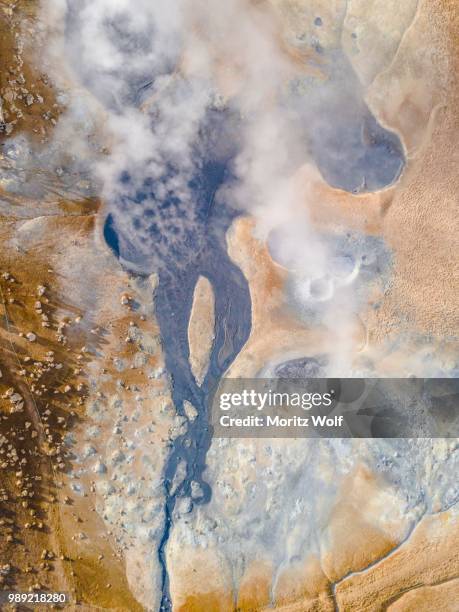 aerial view, steaming river and fumaroles, geothermal area hveraroend, also hverir or namaskard, north iceland, iceland - namafjall stock pictures, royalty-free photos & images